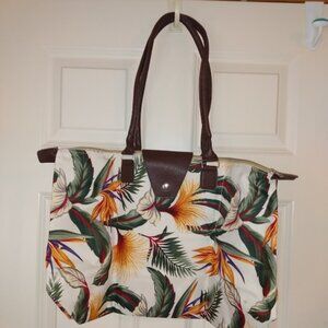 JoAnn Marie Designs: Multi color tote bag with zipper and snap closure.